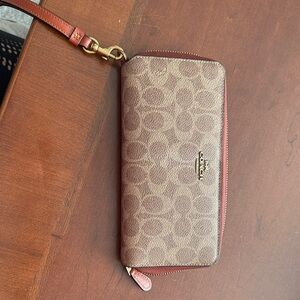 Coach Tan and Carmel Zip-Around Wallet. Essential continental coach wallet.